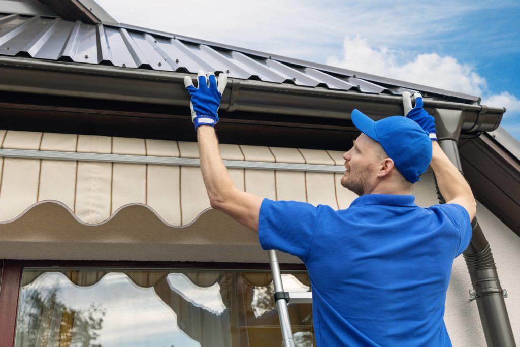 Installing gutters is done by a professional. 