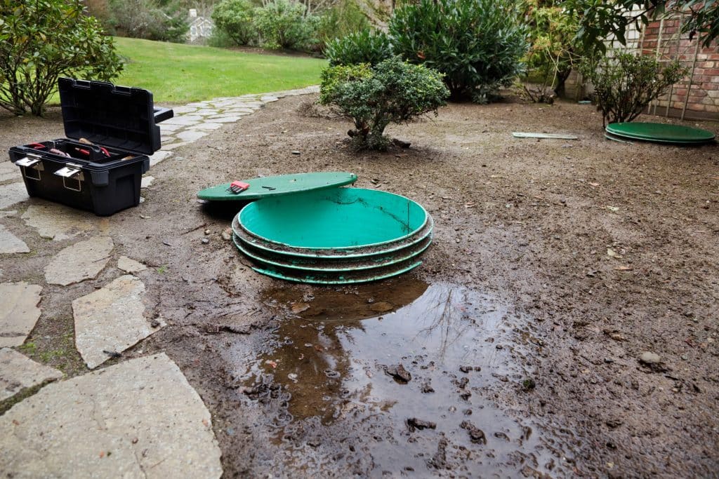 Pooling water by a septic tank means that it may be full. 