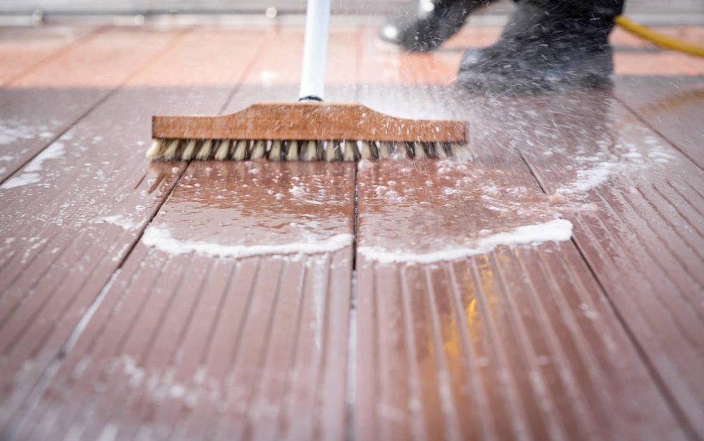 Scrubbing the deck. 