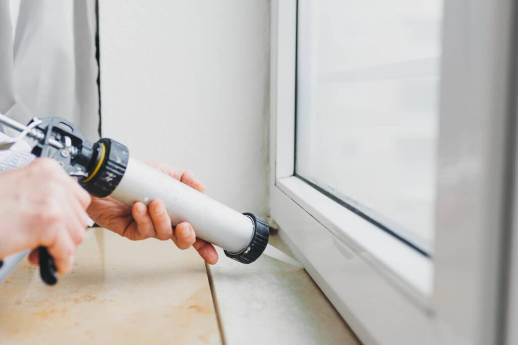 Caulking the basement window will seal it up nicely. 