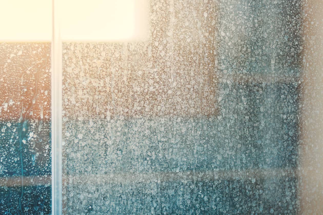 Water stains on glass shower doors.