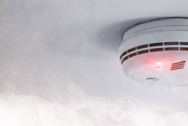 How long will a smoke detector continue chirping after changing the battery?